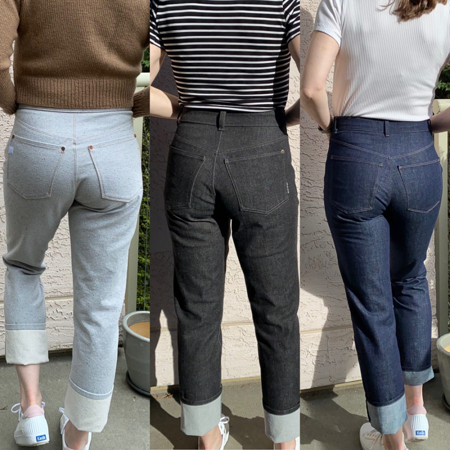 A combined photo showing me wearing all three pairs. Photo is cropped to focus on the backs of the jeans. Grey jeans are on the left, black jeans in the middle, and indigo jeans on the right.