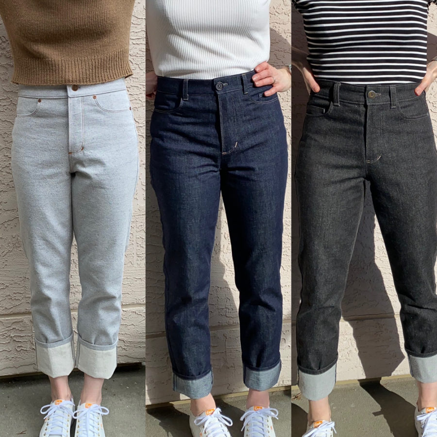 A combined photo showing me wearing all three pairs. Photo is cropped to focus on the fronts of the jeans. Grey jeans are on the left, indigo jeans in the middle, and black jeans on the right. All are rolled at the hem once.